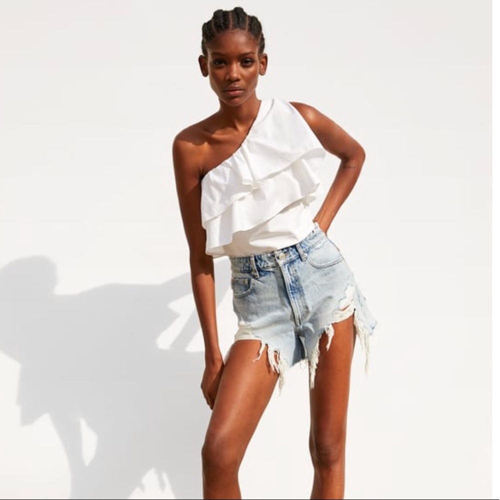 Zara. White asymmetrical frilled top.